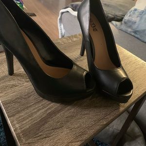 Brash black platform heels